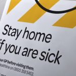 Signage warns people to keep social distancing during the Covid 19 lockdown in New Zealand, 2020