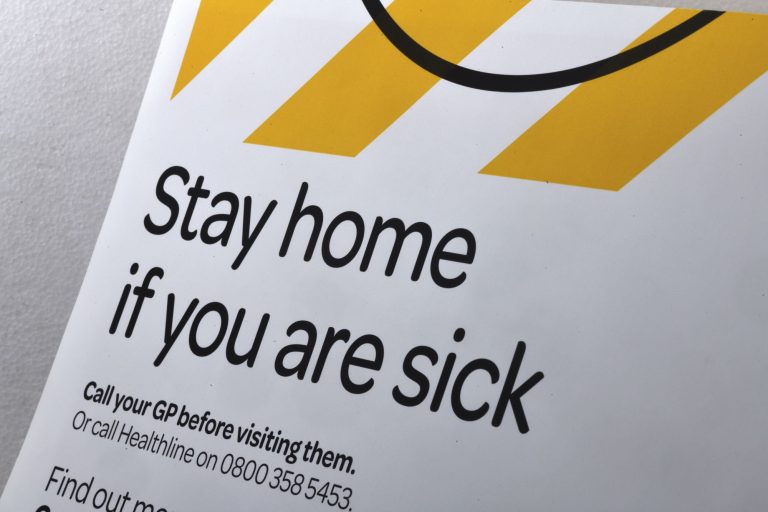 Signage warns people to keep social distancing during the Covid 19 lockdown in New Zealand, 2020