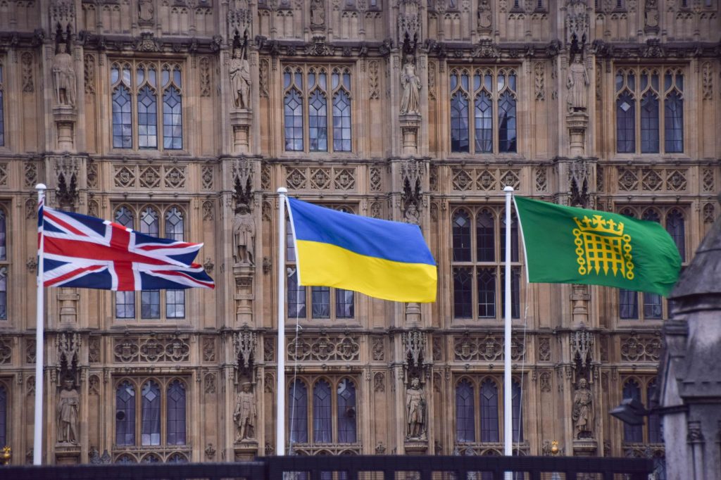 London, England, UK. 6th Mar, 2022. A Ukranian flag flies outside the Houses of Parliament as Russia continues its attack on Ukraine. (Credit Image: © Vuk Valcic/ZUMA Press Wire) Credit: ZUMA Press, Inc./Alamy Live News