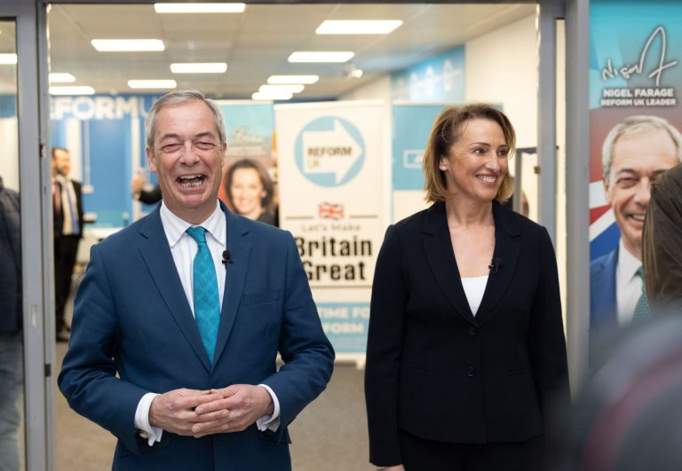 Reform UK leader Nigel Farage stands with Sarah Pochin after announcing her as Reform UK's candidate for the Runcorn and Helsby by-election, at the Rochdale Shopping City in Runcorn, Cheshire. The by-election has been triggered by the resignation of forme