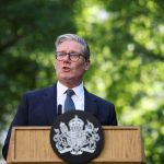 Britain's Prime Minister Keir Starmer speaks during a reception following the UK-EU summit, in London, Monday May 19, 2025. (Hannah McKay/Pool via AP)