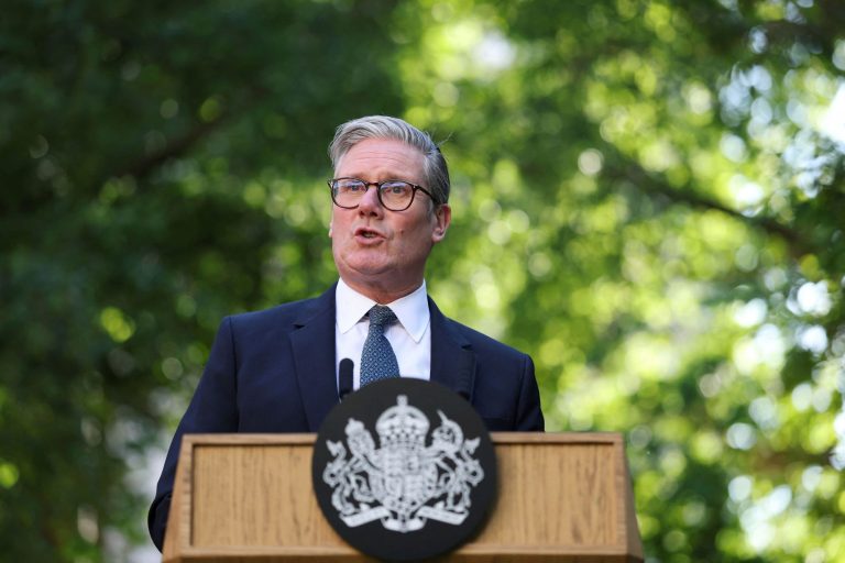 Britain's Prime Minister Keir Starmer speaks during a reception following the UK-EU summit, in London, Monday May 19, 2025. (Hannah McKay/Pool via AP)