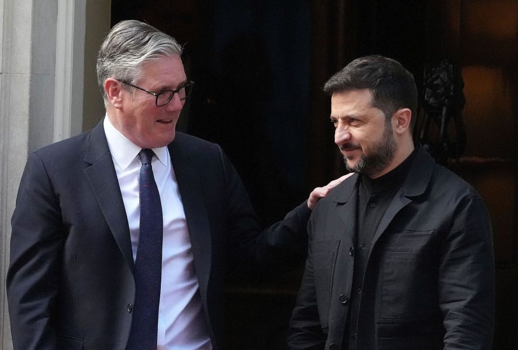 FILE - Britain's Prime Minister Keir Starmer and Ukraine's President Volodymyr Zelenskyy leave 10 Downing Street after a meeting in London on June 23, 2025. (AP Photo/Frank Augstein, File)